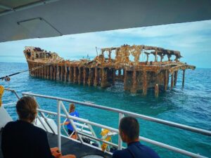 Brad Benedict Instagram - Any kind of structure is likely to be a congregating spot for sea life. Where there are healthy ecosystems, there are sharks! 
.
.
Seen here, SS Sapona was a concrete-hulled cargo steamer that ran aground near Bimini during a hurricane in 1926. The wreck of the ship is easily visible above the water, and is both a navigational landmark for boaters and a popular dive site.
.
.
Catch episode 1 of @sharkweek’s #SharkAcademy tonight on regular #DiscoveryChannel @discovery at 10pm, or binge the whole series on @discoveryplus. 
.
.
#sssapona #bimini #wreckdive #sharkweek #sharks