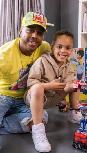 Bradley Mcintosh Instagram - “#AD Did you know, almost 1/5 of us put down our childhood toys for the last time when we’re 5 years old? You all know me as a big kid at heart, but as I’ve found out from working with Hasbro to launch its new Transformers range of toys, 77% of us miss out on play time and the fun to be had with toys because of work, chores, song writing…
 
Me and my son Kairo got the chance to work together on our first major project – where I was given the space and time to introduce him to my childhood favourite toy – Transformers –  we had the most amazing time playing with the brand-new range that he can now hold memories of forever. It’s now his favourite toy, too! Hasn’t left his side since it got here. You can also unlock the joy of play now and throw yourself back to those 90’s memories with your transformers toys by heading to Smyths or the Entertainer #Transformers @transformersofficial @hasbro”