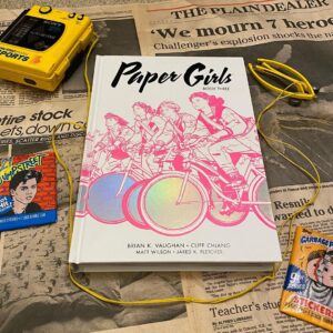 Brian K. Vaughan Instagram - Thanks for supporting your local comic shop! Safely stocked on their shelves today: PAPER GIRLS - BOOK THREE, our final oversized hardcover collection. This one has some particularly swell extras, including a spotlight on letterer/designer/one of the smartest people in comics Jared K. Fletcher, who finally provides a key to deciphering the seemingly alien language he created for our time travelers. The above 80s set dressing is courtesy co-creator Cliff Chiang, an intimidatingly great gift-giver, as well as the artist of that fabulously foiled cover. Also at your friendly neighborhood comic-book retailer right now: Y THE LAST MAN - COMPENDIUM ONE, a brand-new softcover collection of the entire first half of Y in one handsome and affordable volume, ideal for holiday gifting, etc. How many hidden letter Y's can you find in the artwork of genius co-creator Pia Guerra? Because I just flipped through and saw one I’d never noticed. Anyway, in that second photo is the actual straitjacket I once used as a subpar teenage escape artist, and as a prop in some dumb short film that my Dad let me shoot in his office in downtown Cleveland. But I accidentally left the straitjacket behind, and the terrified security guard who found it later that night was convinced an escaped mental patient was loose somewhere in the building. I was probably a lot of fun to raise. #papergirls #imagecomics #amazonprimevideo #ythelastman #dccomics #fxonhulu #saintignatiuscircusclub