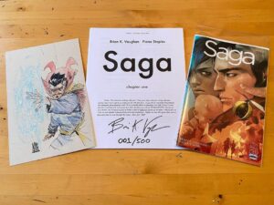 Brian K. Vaughan Instagram - Thanks so much for the kind words about last week’s new Saga, everybody. @fionastaples is absolutely on fire, huh? If you’re looking for something to read while waiting for the next issue, @niko_henrichon and I just released an assembled version of the first 30 pages of our new NSFW graphic novel SPECTATORS, which is always 100% free to read over at Exploding Giraffe (link in bio). Plus, this week’s dispatch reveals how you can win the extravagant prize package pictured above, AND features an update to the 2022 Creators for Creators thirty thousand dollar grant, which has just had its deadline extended to May 31st! Thanks for reading, and hope your afternoon is as lovely as the rainy one we’re enjoying here. 💥 🦒 #saga #spectators #doctorstrange #creatorsforcreators #shillingmywares
