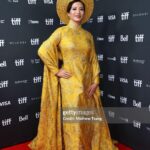 Chantal Thuy Instagram - This week at #TIFF was a dream come true. It’s always been on my bucket list to tell a Vietnamese Québécois story on the big screen and to be part of a film based on such a celebrated novel by @kimthuylythanh fulfilled a deep need as a storyteller. Not only is it the first of its kind for this community, but walking in her mother’s shoes helped me understand my own mom’s journey more deeply. In the process of shooting this film last year, I too became a first time mom. To add to this, the most magical part of the night besides watching the film with my RU family and best friends, was being dressed in a custom traditional Vietnamese Áo Dài khăn đóng created by @thainguyenatelier. Thai not only made me feel beautiful in this dress (as a 8month postpartum mama, I was nervous about getting back on a red carpet 🤷🏻‍♀️), but he made me feel pride in representing and celebrating my culture. I’m holding onto everything I can that is a part of my Vietnamese heritage (language, food, customs) and wearing this beautiful Áo Dài khăn đóng certainly is an important part of it. I’m writing this as my sister union in the US is on strike, and acknowledge that we’re going through an extremely difficult time right now. I’m thankful that SAG-AFTRA allowed me to promote this film (under a UDA contract). I’m proud to have worked on my first Canadian film, which was entirely funded by the Canadian & Quebec government agencies @la.sodec @telefilm_canada @amalga.prod @imminafilms @tiff_net ❤️ Gorgeous hair & makeup by @ivylammakeup Toronto International Film Festival (Tiff)