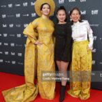 Chantal Thuy Instagram - This week at #TIFF was a dream come true. It’s always been on my bucket list to tell a Vietnamese Québécois story on the big screen and to be part of a film based on such a celebrated novel by @kimthuylythanh fulfilled a deep need as a storyteller. Not only is it the first of its kind for this community, but walking in her mother’s shoes helped me understand my own mom’s journey more deeply. In the process of shooting this film last year, I too became a first time mom. To add to this, the most magical part of the night besides watching the film with my RU family and best friends, was being dressed in a custom traditional Vietnamese Áo Dài khăn đóng created by @thainguyenatelier. Thai not only made me feel beautiful in this dress (as a 8month postpartum mama, I was nervous about getting back on a red carpet 🤷🏻‍♀️), but he made me feel pride in representing and celebrating my culture. I’m holding onto everything I can that is a part of my Vietnamese heritage (language, food, customs) and wearing this beautiful Áo Dài khăn đóng certainly is an important part of it. I’m writing this as my sister union in the US is on strike, and acknowledge that we’re going through an extremely difficult time right now. I’m thankful that SAG-AFTRA allowed me to promote this film (under a UDA contract). I’m proud to have worked on my first Canadian film, which was entirely funded by the Canadian & Quebec government agencies @la.sodec @telefilm_canada @amalga.prod @imminafilms @tiff_net ❤️ Gorgeous hair & makeup by @ivylammakeup Toronto International Film Festival (Tiff)