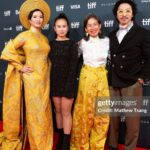 Chantal Thuy Instagram - This week at #TIFF was a dream come true. It’s always been on my bucket list to tell a Vietnamese Québécois story on the big screen and to be part of a film based on such a celebrated novel by @kimthuylythanh fulfilled a deep need as a storyteller. Not only is it the first of its kind for this community, but walking in her mother’s shoes helped me understand my own mom’s journey more deeply. In the process of shooting this film last year, I too became a first time mom. To add to this, the most magical part of the night besides watching the film with my RU family and best friends, was being dressed in a custom traditional Vietnamese Áo Dài khăn đóng created by @thainguyenatelier. Thai not only made me feel beautiful in this dress (as a 8month postpartum mama, I was nervous about getting back on a red carpet 🤷🏻‍♀️), but he made me feel pride in representing and celebrating my culture. I’m holding onto everything I can that is a part of my Vietnamese heritage (language, food, customs) and wearing this beautiful Áo Dài khăn đóng certainly is an important part of it. I’m writing this as my sister union in the US is on strike, and acknowledge that we’re going through an extremely difficult time right now. I’m thankful that SAG-AFTRA allowed me to promote this film (under a UDA contract). I’m proud to have worked on my first Canadian film, which was entirely funded by the Canadian & Quebec government agencies @la.sodec @telefilm_canada @amalga.prod @imminafilms @tiff_net ❤️ Gorgeous hair & makeup by @ivylammakeup Toronto International Film Festival (Tiff)