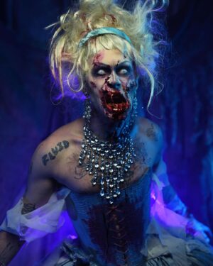 Charity Kase Instagram - Prince Harming 👑 🪓 
Photo by the amazing @horrifymeuk 

Used: 
@mehronmakeup @mehronuk liquid latex, fake blood, scar blood
@bennyemakeup setting spray, liquid liner 
@hudabeauty setting spray, primer, flawless powder, concealer 
@beautybaycom brushes and eyeshadow pallet 

#cinderella #zombie #horrifyme #dragmonster