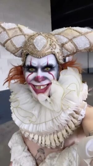 Charity Kase Instagram - You’ll float too 🤡 

Hat, ruffles and corset from @prangstacostumiers 
#it #pennywise #dragcon