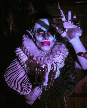 Charity Kase Instagram - Just in time to curse Christmas 😈

Photo by @phoebes_path 
Wearing @prangstacostumiers 
Contacts by @sclera_lensesdotcom 
#dragmonster #nosferatu