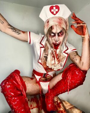 Charity Kase Instagram - Dr Kase will see you now 💉 🩸 

Wearing full Halloween look by the gorgeous devils over at @lovehoneyofficial 👹

Discount Code: CHARITYKASE20

#Lovehoney #HalloweenCostume #DragMonster #AD #SilentHill