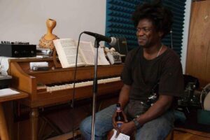 Charles Bradley Instagram - This month marks the 10th anniversary of the release of Charles Bradley’s debut album, No Time For Dreaming, and we’re sharing some words from producer and songwriter, Thomas Brenneck. 
・・・
It was nothing short of magic recording what would become Charles Bradley’s debut album No Time For Dreaming in a bedroom on 250 Menahan street many years ago. It’s hard to believe it’s been 10 years since it’s release. I had set up a humble recording situation consisting of a 1/2” 8 track tape machine and an sm58. For years in between tours with Sharon, Budos, El Michels, Lee, Amy, etc I would record as much music as possible at the crib. At some point I invited Charles over and played him what would become Menahan Street Bands debut Make The Road By Walking. He loved the music which meant the world to me and instantly asked if he could sing on it. 

True story: The first time he came to that apartment i played him the instrumental of The World Going Up In Flames. He immediately asked for a mic and started singing. Within the hour we recorded the vocals to it. After that he would come back once or twice a month to share stories of his life which we would turn into songs. The next song we wrote was “Heartaches & Pain”. You couldn’t ask for a more honest and raw record. No frills. He believed Art was a reflection of suffering and that’s what he spoke about in his lyrics. But by addressing the ugly truths of the world that he had experienced first hand, he in turn made a statement full of hope. 

Much love to everybody involved and supportive during that incredible time in our lives. @menahanstreetband @budosband @funkmusicinstitute alexkadvan 

Photos by @funkmusicinstitute