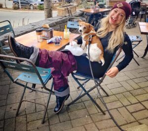 Chelsey Reist Instagram - attempting to jump a four foot gravel road skiing down a mountain at max speed sometimes ends with tiny doggies, tensors and tequila. 
it also sometimes ends in the middle splits with your body somersaulting through your legs...so i hear 😂

i definitely support safe skiing and i also support taking risks; genuinely feel pumped and proud of myself for attempting this trick with gusto. looking forward to icing this down quickly, would be a win to land it before the #skiseason is over. (check out our janky tensor job with a ski strap😂) #adrenalinerush #reistmode #beastmode #nomakeup #nocares and thanks to the fan who bought me this dope toque— told ya i couldn’t wait to wear it!
#whistlerdreamgetaway