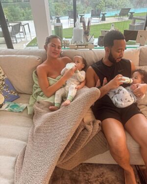 Chrissy Teigen Instagram - babies and dogs and maybe a nip who cares