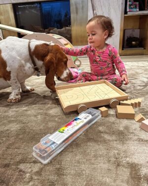 Chrissy Teigen Instagram - babies and dogs and maybe a nip who cares