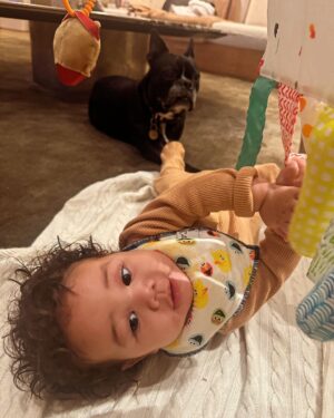 Chrissy Teigen Instagram - babies and dogs and maybe a nip who cares