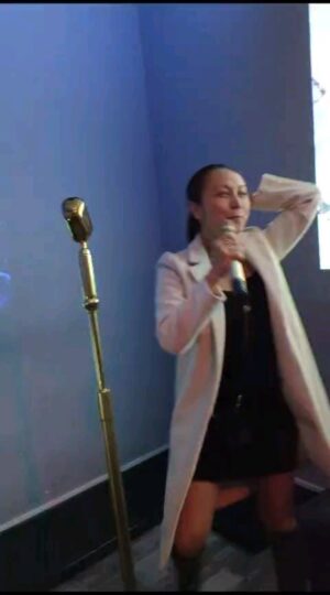 Christine Nguyen Instagram - The look on my colleague's face is everything here. 😅 🎶🎙🎶

#lovekaraoke #notasinger #MoxieKaraoke