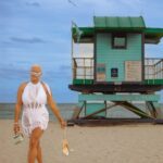 Claire Sulmers Instagram - Last day in #Miami , I kicked it with friends old and new at @sohohouse #sohobeachhouse . It was kinda cold and very overcast but I couldn’t miss the opportunity to wear this @dipetsa dress🌊 Heels: @femme_la Sunglasses: @prada Thx to the brands that dressed me during #miamiartbasel and much love to the many talented photogs I met while in #Mia 💣 To have me wear your brand, e-mail book@clairesulmers.com. 📸 @oneshotmia #thebomblife #beach #beachvibes #dipetsa #artbasel #artbaselmiami #miamibeach #miamibeachflorida #whiteparty