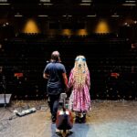 Clare Bowen Instagram - This whole full circle thing has me a bit lost for words. It’s an honour to bring my friends, my love, and the the music I’ve found on my adventures away, back to this place, where I learned so much, so many years ago. We’re just gunna drink it in with y’all, and make the joint glow tonight, Wollongong. Thank you for having us. Thank you for coming. Thank you for everything. 🌊💕✨ Also thank you @magnoliapearlclothing for the most fabulous tuxedo jacket, and everything else you’ve dressed me in for this tour. I always feel like the best version of me in your beautiful creations, and am eternally grateful. 🧵🤍💫✨ 📷 @all_the_single_gradys #DharawalCountry #illawarra #southcoast #family #memories #baptismoffire #uow #clarebowen #brandonrobertyoung #timothyjamesbowen #imogenclark #ipac #americana #nashville #australia #countrymusic #bowenyoung #wollongong #altcountry #storyteller #magnoliapearl #slowfashion #love #allsaints Illawarra Performing Arts Centre (IPAC)