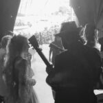 Clare Bowen Instagram - Hit the YouTube link in our bio to catch a new video premiering right now! 🎥 ✨ It was one of our favourite performances in Australia, and we’re so happy we got to experience it with @timothyjamesbowen! 🖤✨ #youtube #newvideo #livemusic #bts #behindthescenes #bowenyoung #christmas #summer #australia #nashville #americana #johnlennon #timothyjamesbowen #brandonrobertyoung #clarebowen #carolsbycandlelight #visionaustralia Sidney Myer Music Bowl