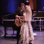 Clare Bowen Instagram - ❤️NASHVILLE❤️ See you TONIGHT at @anzieblue! 🥰 We’re so honoured to get to be a part of @americanafest, and play a showcase before we head out with the #NashvilleReunionTour! (Here we are being gross behind the scenes in rehearsal.. 🫠💕✨) See you tonight! Ticket link in bio. ♥️ 📷 @timothyjamesbowen 👗 @magnoliapearlclothing #nashville #anzieblue #opry #rehearsal #americana #americanafest #duo #love #kiss #magnoliapearl #lovers #nashvillecmt #nashvilleabc #bowenyoung #clarebowen #brandonrobertyoung #reunion #livemusic #showcase Grand Ole Opry