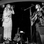 Clare Bowen Instagram - ❤️WOLLONGONG❤️ 4 sleeps ‘til we get to you with @timothyjamesbowen & @imogenclarkmusic! 💫✨ @clarembee hasn’t been back to this theatre since the end of her @uow era, circa 2009. We’re considering a scavenger hunt for the green Doc Marten (singular) she lost whilst working with @vanbadham on “4 Plays About Wollongong”, and are intrigued to potentially locate the dent she left in the stage when she jumped off set scaffolding every night playing Peer Gynt, and kinda sorta maybe landed badly on one of them. 😬 See you this Saturday night at the Illawarra Performing Arts Centre (IPAC) for something completely different.. it’s where all the nostalgias are at. 🙃💫✨ You can still find tickets at the link in our bio, and at www.bowenyoung.com 🖤✨ And (Clare chiming in here) can anyone tell us where the best place to get a drink after the show might be? I have a feeling @brandonrobertyoung’s gunna be thirsty.. 🥂✨ 📷 @samantham_shots #wollongong #uowalumni #clarebowen #brandonrobertyoung #nashville #australia #americana #altcountry #countrymusic #harlowlovesdaisy #allsaints #imogenclark #timothyjamesbowen #livemusic #tourlife #lovers #love #duo #bff #returnofthebowen #storytelling #blackandwhitephotography #stage #drmartens #ipac #illawarra #dharawalcountry #merrigongtheatreco