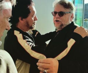 Clifton Collins Jr. Instagram - Getting schooled ! Big ol happy birthday to this legend, @gdtreal . Both a gift to cinema and humanity, for these stories teach compassion , empathy , patience , all human traits that as a whole we seem to be stepping so far away from. We all have stories to tell, and they are often daunting, for the fear of addressing the pain in one’s story is very real , and deeper than one can even imagine, paralyzing at times. I personally don’t know how I would have began this journey if not for Guillermo one evening sitting me down, telling me , that not only I CAN do it, but that I MUST!  Am forever grateful for the love n mentorship ! Some dear fam is some of these @realmikejudge @cheechmarin ❤️🙌