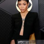 Coi Leray Instagram - 2X GRAMMY NOMINEE 💋🎏 📸 @princeofthegram 👑 Special Thank You to @anthonyvaccarello and the entire team at @ysl for allowing me to do what’s never done before💚 This Archive moment was so iconic. @mazurbate love growing with you 💚 @nikko.anthony @carlyle.nicole @yaris.nails you guys are incredible and such an amazing team. @recordingacademy Thank You again 💖💋💚 The Grammys