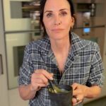 Courteney Cox Instagram - Mmmmm soup (vegan zucchini leek) 4 large zucchini 1 1/2 cups cashews 8 cups Veggie broth 2 leeks Olive oil Salt White pepper (black fine too) Chili flakes (optional) Garlic cloves (3-5) Before you start soak 1 and a 1/2 cups cashews in filtered water for one hour Cover bottom of pot with OO and generous pinch of salt and garlic cloves Thinly slice leeks and then sauté until they soften -about 5-10 min Slice zucchini in rounds then add to leeks Add more salt and teaspoon of pepper Add pinch of chili flakes *optional Add 8 cups of veggie broth Add soaked cashews Bring to a boil and then cover with a lid bring down to a simmer for about 45 minutes Add to a blender (or use hand blender) to purée If you’re not vegan you can add grated pecorino on top