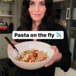 Courteney Cox Instagram - Happy #NationalPastaDay! Here’s one of my favorites: Pasta Alla Checca *Fresh garlic chopped (lots) *Roma or cherry tomatoes *Buffalo mozzarella (in water) *Basil (lots) *Olive oil *Penne pasta *Fresh grated parmigiana *Salt and pepper 1. Chop tomatoes (de-seed if you want), add basil + salt and pepper, place in bowl. Cover and let marinate. 2. Slice a ton of garlic and brown in olive oil. 3. Boil water/cook pasta. 4. Drain water from mozzarella and cube. 5. When pasta is done, drain + add tomatoes/basil mixture with any juice made from the marinating tomatoes. 6. Add cut mozzarella. 7. Add warm garlic olive oil. 8. Add parmigiana + salt and pepper to taste. Optional: add red pepper flakes if you want a little kick. #courteneycoox