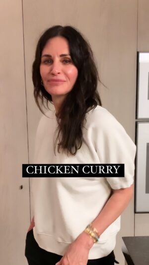 Courteney Cox Instagram - CHICKEN CURRY... you ready for this one? 👩‍🍳 

•1 lb. chicken tenders cut into small cubes
•1 small onion, chopped
•1/2 tsp. chopped serrano chili (optional)
•1 tsp. unsalted curry powder
•Salt to taste

•1-2 cups curry sauce (recipe below)
•1/2 T chopped green onion
•1/2 T chopped cilantro

1. Heat a medium size frying pan over med-hi heat. Spray with coconut oil, sauté onion and serrano chili.
2. Add chicken, curry powder and salt. Sauté until chicken is slightly brown on outside but not cooked through.
3. Add curry sauce and reduce heat to simmer. Cover and simmer for 5-10 minutes until chicken is cooked through.
4. Top with chopped cilantro and onion. 

CURRY SAUCE:
•1/2 brown onion
•1 clove garlic
•1 T ginger
•1/2 serrano chili (stem and seeds removed)
•1 to 2 T unsalted curry powder
•1 box of organic chicken stock
•1 cup of chopped cauliflower

1. Place the onion, garlic, ginger and chili in a food processor and blend until you have a paste.
2. Heat a medium size stock pot over med-hi heat. Add paste and 1 to 2 T of broth to sauté paste until it starts to brown. Add more chicken stock little by little if the paste is browning too fast or starting to burn. 
3. Once the paste is cooked, add the curry powder and another splash of chicken stock. Cook for another minute, stirring the mixture so it doesn’t burn.
4. Add the rest of the chicken stock and the cauliflower. Bring to boil, then reduce heat and simmer for 20 minutes or so, until cauliflower is tender.
5. Transfer to a blender and puree until sauce is smooth. Always start blender on lowest speed when you are blending hot food, otherwise it will explode all over the kitchen. You can add water or more broth if sauce is too thick.
6. Taste and adjust seasoning, adding salt or coconut milk for sweetness. 

Serve over cauliflower or basmati rice. Thanks, Jill Elmore! 

🎥: @jadeehlers