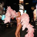 Courtney Boerner Instagram - Dreaming of angels 🩷 @vasarostyle #timessquare #newyorkcity #angels 📸 @its_zander_j Time Square New York New York
