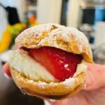 Courtney Ford Instagram - Gluten-free pastries to celebrate our 1st indoor family gathering in over a year and a half🥳 Grateful for: family, vaccines, hugs, music, dancing, and pastries with a side of nachos, (don’t worry about it). Baking shout out to @bobsredmill 1-1 gluten free flour (w/ 3 eggs plus 1 egg white to make choux that was lighter than air ☁️), @meyenberggoatmilk (for the base of the silkiest, most luxurious creme patissiere I’ve ever made- I mean. look. at. IT!- which my family could enjoy w/o digestive issues, and when it came down to choosing between cow or goat dairy pastry cream, they said “f(orget) the cow”😜 cc @taylororci) Sous chef shout out to @roxythegent for piping perfect eclair-sized eclairs, while I piped Murder Durder hoagies, and for filling them like a boss. As my son likes to say: best. day. ever.☀️
