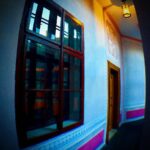 Crispin Glover Instagram - This is a wider photograph that includes an image of the fresco above the door that was also seen in the previous posted image. Also more of the fresco of the hallway can be seen. Zamek Konarovice Czech Republic