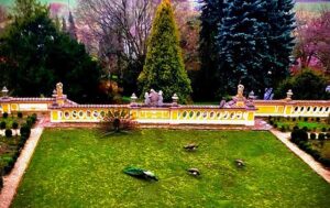Crispin Glover Instagram - One peacock displays while five peafowl look in other directions in the parterre at Zamek Konarovice Czech Republic