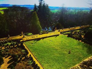 Crispin Glover Instagram - I keep meaning to go back inside to continue the tour of the interior but this photo is a sort of a reverse of the previous photo. In this photo one can see from the second floor of Zamek Konarovice down over the parterre and the statues on the balustrade the pond that was on the right side of the previous photo. One may also notice the lone peahen in the middle of the parterre. Soon I will continue  photos of the interior tour of Zamek Konarovice Czech Republic.