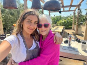Cristina Ferrare Instagram - We spent the afternoon at our  daughters @alextcooks and her fiancé’s @itsnickdrake home with the amazing  production team from @movablefeast_tv that Alex hosts for @pbs airing this fall! The food was simply beyond! A great time was had by all as we gathered around the table to enjoy the bounty with family and friends!Thank you to everyone for a spectacular afternoon! @wbgh #moveablefeast #tv #cookingshow #food #love #family