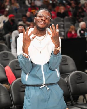 D.C. Young Fly Instagram - My dawg @russwest44 gave me his jersey tonite!!!! Outta alll the jerseys this def my favorite one Brodie 💪🏾💪🏾 hangin dis up fashooo
