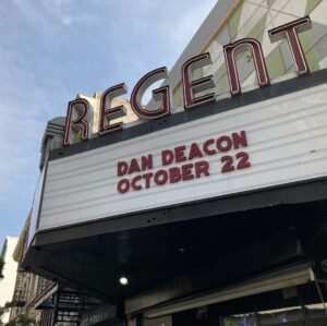 Dan Deacon Instagram - Hi! Tour starts tonight in LA. The last time I was here was March 13th 2020, we drove the bus to an RV park by the airport and basically waited for the world to end and shutdown to being. The last few photos are from that weird night back in 2020. 

Feels surreal to be back, picking up where I left off. So much is different now. Feels like a parallel universe. 

I’m glad to be doing these few shows now and for anyone in a city that couldn’t happen on this run, please know it wasn’t an easy choice to make. 

I am doing the best I can to transition back into touring after such a long and insane break from it.

Stay safe, get \/axxed, mask up, sassy as fuck at all times
