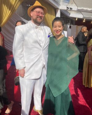 Dan Deacon Instagram - Went to the Oscars and walked the red carpet with the @ascensiondocumentary team! 

Brief and incomplete summary of highlights: 
It was bonkers. 
-Anthony Hopkins told me he liked my hat. 
-Met Bill Murray and I could hardly speak. 
-The chocolate Oscar’s at the Afterparty are coated in a gold glitter that gets on everything you touch. 
-They do not want you to take table cloths home and ask you to put it back if you try to wrap up a chocolate Oscar in it so you stop getting gold powder on everything. 

Thanks to event who sent me pictures when they spotted my hat on TV.

THANK YOU so much to @jk_or_am_i for including me on the team for Ascension and having such a brilliant and unique vision!!!! I love this film. I love working with you and I am so beyond excited to see what you create next!!!

Congrats to the whole team! It was amazing to celebrate how far this super weird movie has made it. 

Congrats to @questlove and the whole Summer Of Soul team for your well deserved win!

Ok flying to join back up with the @futureislands tour. See you soon Dublin! Thank you so much to all of you for your support in my weird life ❤️