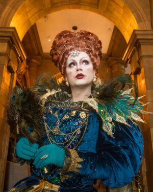 Daniel Wallace Instagram - I feel like i have been so busy lately i haven't had time to do any posts.I have neglected the insta....so here is a picture from a few weeks ago @therefugemcr celebrating the #plattyjoobs 
Photo by the exceptionally talented @elspethmarymoore
 Hair by the ever fabulous @florencias_wigs and gown by the sublime seamstress @lizziebiscuits 
#Queen #queenelizabeth #Regal #Elizabethan #dragqueen #Drag