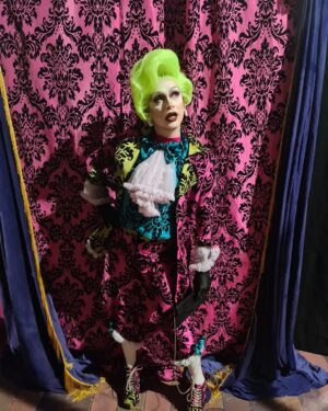 Daniel Wallace Instagram - Sometimes i like to blend in....It was Press night last night and i just couldn't resist popping on this lil number by @freakcouturemcr The curtains really do match the drapes!!!Can you believe i own a suit made from the same gorgeous material as the curtains that hang in Shantay Manor in @deathdropplay ?!
A lovely time was had and i now own the worst hangover everrrrrr to prove it!
Suit by @freakcouturemcr
Hair by @florencias_wigs
Gorgeous moon earringz by @wonderfullittleweirdos
Piccys by @applederrieres
#lovelytime #Curtain #wallflower #pink #green #drag #neon