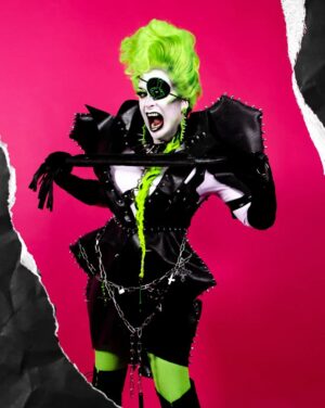 Daniel Wallace Instagram - Monsters of Rock part 1
Feeling like a bad ass and rocking it on the floorshow.
Front and back!Check out the detail on the spine!
I always feel at my best with a pop of UV (I've worn it ever since beginning my career in drag in the nightclubs of Manchester as it really does make you stand out and I wouldn't want to fade into the background or anything 😂)
Thankyou to @florencias_wigs @punkmunkeee @shopfairlyodd who helped me feel my rock star fantasy 🖤
And @Faketrash for taking such fabulous pics 💚