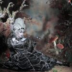 Daniel Wallace Instagram - Little miss muffet sat on a tuffet eating her curds and whey, along came a spider and sat down beside her and frightened miss muffet away.... Just look at this gorgeous image of me Snapped by @neilnezkendall in a spooky ooky gothic wood! Wearing @lizziebiscuits and @florencias_wigs 🕷🕸 #spider #blackwidow #hypnotized #operaglasses #littlemissmuffet #Drag #dragqueen #manchesterqueens #spiderweb Chester, Cheshire