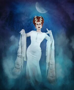 Daniel Wallace Instagram - She's alive!She's ALIIIIIVE!!!!Working a Bride of Frank lewk on the streets of Salford next for the next Halloween inspired shoot by the glorious @faketrashstudio 
 Wearing a fabulous ginger do (did you know she actually had red hair but filmed in black and white?) by @florencias_wigs
#Bride #Thebride #thebrideoffrankenstein  #Spooky #Dragqueen #queer #halloween