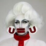Daniel Wallace Instagram - U =U Manchester Pride is well and truly in swing!The festivities have well and truly begun and i am already nursing a hangover!Pace yourself kids! Hopefully see all of your beautiful faces over the big weekend at some point or other! Now one of my favourite things to do over pride is the parade(which sadly we have been unable to do the last few years)so i will be on the GHT float again this year with all my brothers sisters and queers sharing the message that U =U and challenging stigma! Come give us a wave!Happy pride!❤ New image by @faketrashstudio Earrings by the amazing @shopfairlyodd wig by @florencias_wigs Islington Mill
