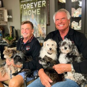Danny Robertshaw Instagram - Danny & Ron with some of their personal rescue dogs. Isabelle, Tilly, Sissy, Howdy, and Busy Bee are just 5 of 10 personal dogs that often travel with them! 

#TheRoadies 
#ALifetimePromise