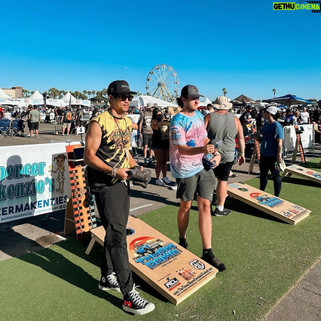 David Lim Instagram - Summer vibes with my bro @tony.smith0, the @americancornholeleague MVP and #1 ranked player in the world. 😎🎡🌴🕳️ Huge thanks to @thethrowdowncornholefestival for letting us come crash the party. #airmailcity #thethrowdown Ventura, California