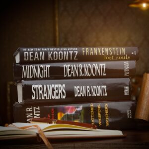 Dean R. Koontz Instagram - Q: Any clues about what you’re working on? 
A: It has covers but isn’t a bed & comes with a jacket that isn’t an article of clothing.