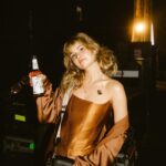 Debby Ryan Instagram - peach tea in a glass bottle 🤩🍑🫠🧃swipe for corny Hurricane Festival