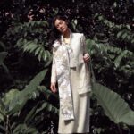 Dian Sastrowardoyo Instagram - In this latest #SAPTOJOEditorial styled by Hagai Pakan, the focus is not just on showcasing the traditional garment but infusing it with a modern twist. The ultimate aim is to spark inspiration among enthusiasts, encouraging them to explore innovative and modern pairings that transcend the conventional boundaries of this cultural attire. Visit the link in bio for the complete article. Dian Sastrowardoyo wears a custom oyster-colored Yayi Darpana Kebaya Janggan, Yayi vest (worn underneath), Rimpang selendang, and hand-embellished Sangkar midi skirt. Photographer: @bramsky.bramsky Fashion Stylist: @hagaipakan Makeup Artist: @ryanogilvy Hair Stylist: @iwanetaufik_hair Location: @thedharmawangsa #SAPTOJOHeritage #SAPTOJOBerkain #SAPTOJOEditorial