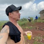 Diplo Instagram - landed in Nairobi got an uber to Mount Kilamanjaro, realized it’s in Tanzania so we went to this other mountain with some cows. climbed with some friends met some country music fans listened to the hum of windmills , pet some more cows got bit by fire ants drank sugarcane and then took a nap .. Come to Africa it’s beautiful 🌍🇰🇪 Nairobi, Kenya