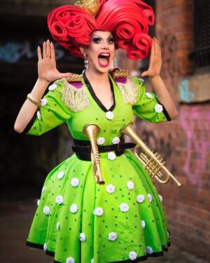 Divina De Campo Instagram - I adore Panto and love that @dragraceukbbc payed homage to it this week! 

It was panto that inspired my hometown look for series 1. Panto and the theatre was such a big part of growing up in #Brighouse ; the Civic hall, St Mathews, St John’s and the occasional school pantos too. 

Each part of the costume references something to do with the town in some way from the canals to the brass bands the white rose of yorkshire and even Gravy! 

#panto #drag #dragraceuk #hometown #foamwig #UK #og
