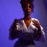 Donisha Rita Claire Prendergast Instagram - Stillness. I’ve discovered that the artist and the spiritual healer occupy the same space when in performance. Moving through time as energy manifesting physically. The body becomes a vessel, the voice an echo that resounds from the past into the present. Sometimes the future escapes our lips and begins planning even before we truly believe. The power of words cannot wait for you to believe in them. Humanity needs us to vibrate at the highest level of existence. Access the chakras and embrace the glow. 📸@komiolaf - The visual poet Face Art @ndaiart Stylist @missawena Location @mytostudio #crown #chakra #indigo #iexisteverywhere #rightyourstory #befree #africandiaspora #artisevolution Toronto, Ontario